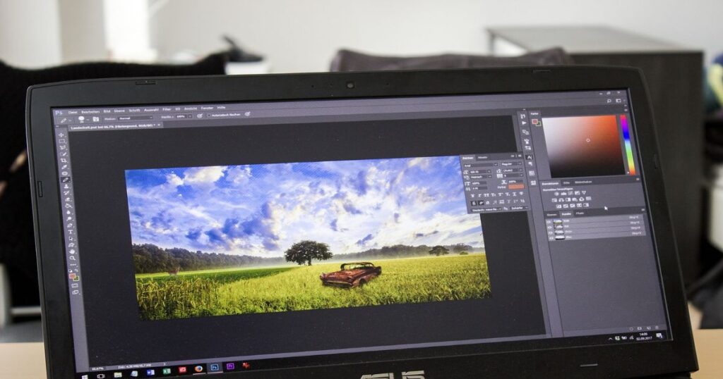 Beginner using a free video editing tool on a laptop with drag-and-drop timeline interface